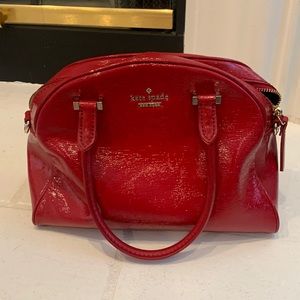 Good condition red patent Kate Spade bag